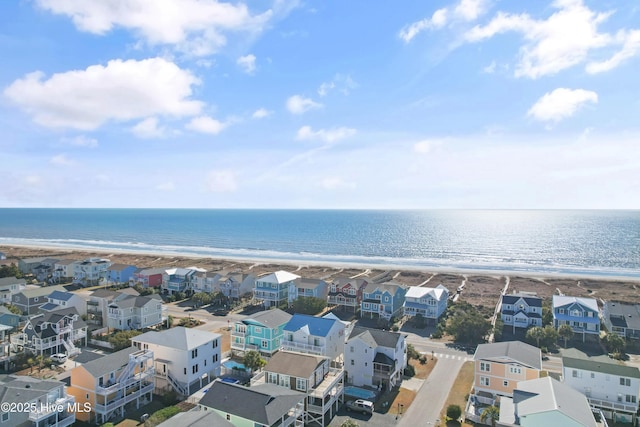 aerial view with a water view, a residential view, and a beach view