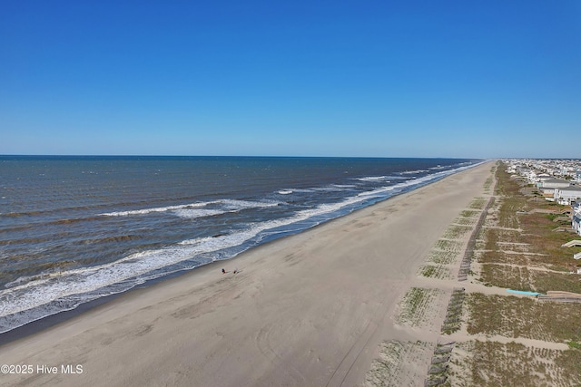 property view of water featuring a beach view