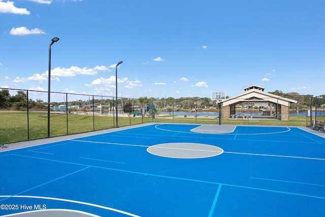 view of basketball court featuring community basketball court, a gazebo, and fence