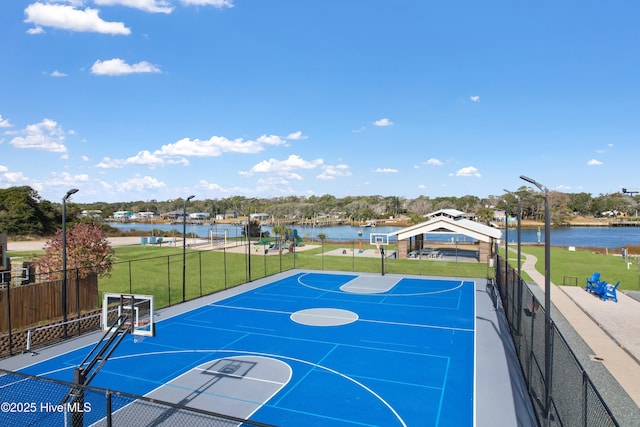 view of basketball court featuring a gazebo, community basketball court, fence, and a yard