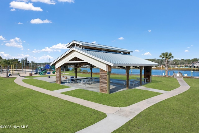 view of home's community featuring a water view, a yard, and a gazebo