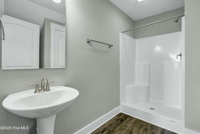 143 Talbert Dr, Rocky Point, NC 28457 - bathroom featuring wood-type flooring, sink, and walk in shower