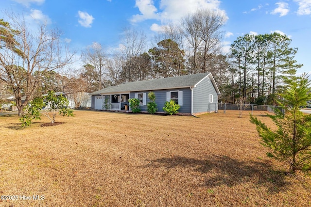 ranch-style house featuring a front lawn and a porch