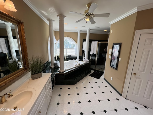 bathroom featuring decorative columns, crown molding, independent shower and bath, and vanity