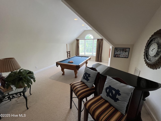 recreation room with light colored carpet, vaulted ceiling, and billiards