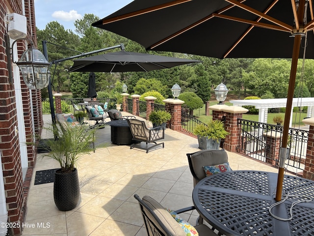 view of patio featuring a pergola