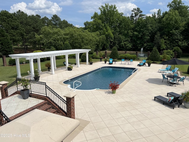 view of swimming pool featuring a patio and a pergola