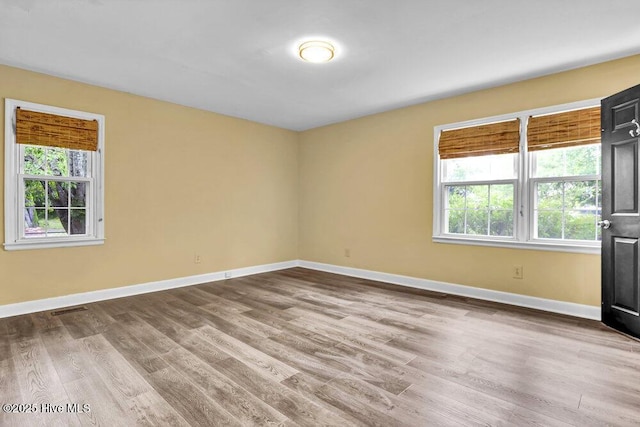 2817 Park Ave, Wilmington, NC 28403 - empty room featuring wood finished floors and baseboards
