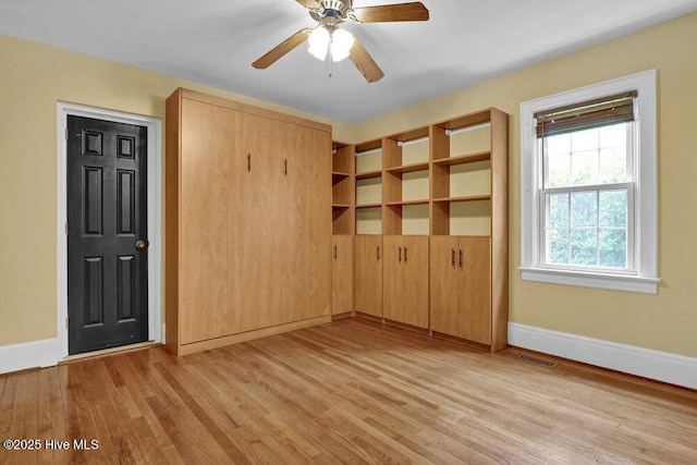 2817 Park Ave, Wilmington, NC 28403 - spare room featuring baseboards, light wood finished floors, and ceiling fan