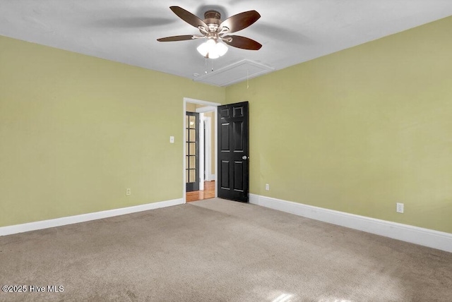 2817 Park Ave, Wilmington, NC 28403 - carpeted spare room with attic access, a ceiling fan, and baseboards