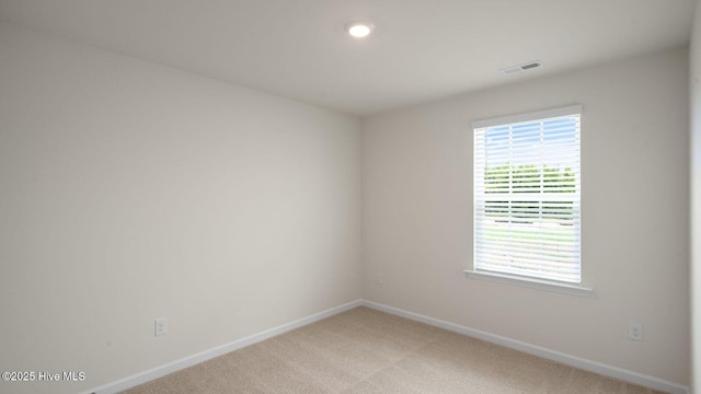 view of carpeted spare room