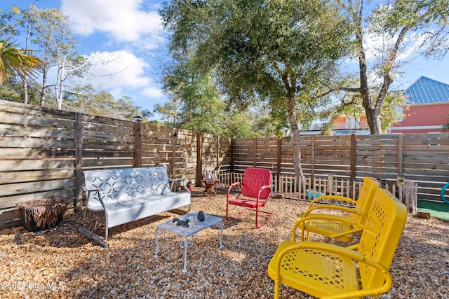 exterior space featuring a fenced backyard