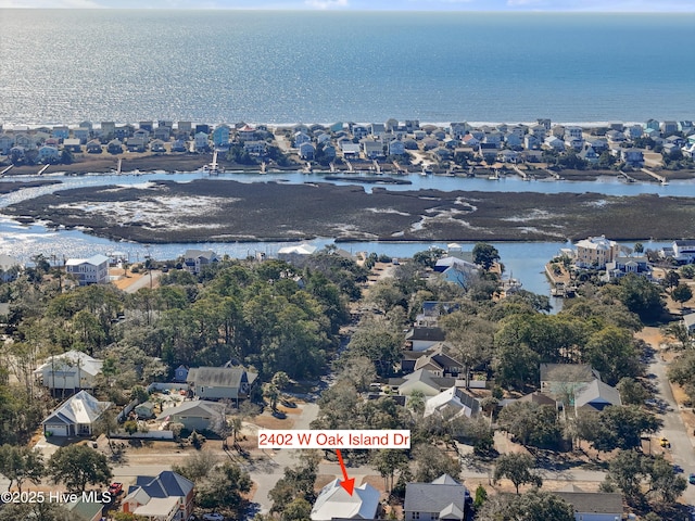 aerial view featuring a residential view and a water view