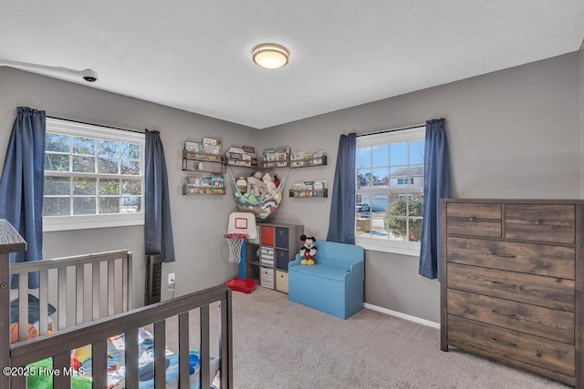 bedroom with light colored carpet