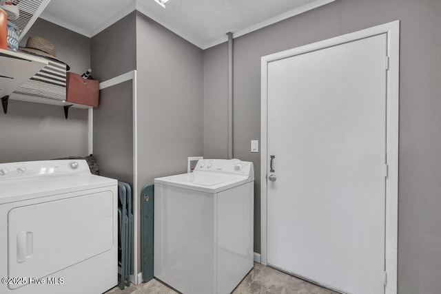 laundry room featuring washing machine and dryer