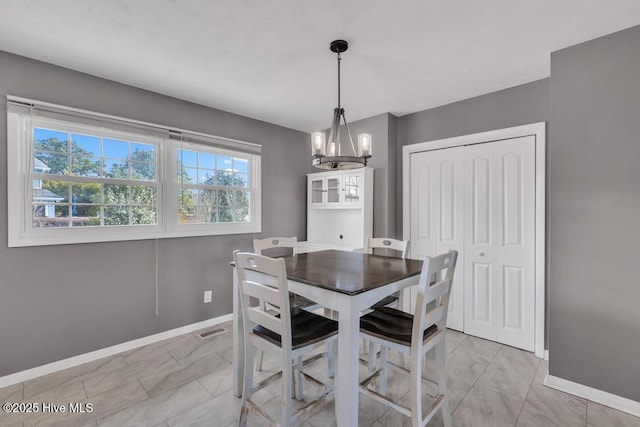 dining room with an inviting chandelier