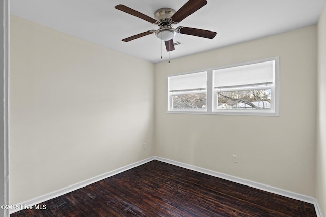 unfurnished room with hardwood / wood-style flooring and ceiling fan