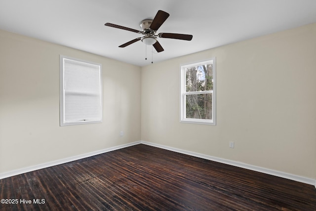 unfurnished room featuring ceiling fan and dark hardwood / wood-style flooring