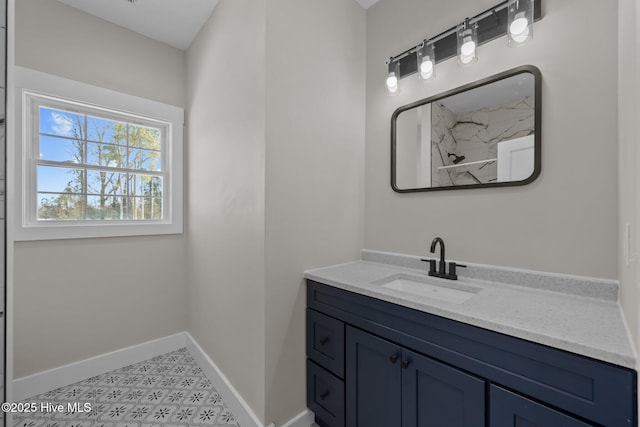 bathroom featuring vanity and tile patterned flooring