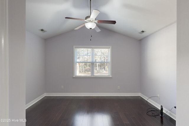 unfurnished room with vaulted ceiling, dark wood-type flooring, and ceiling fan