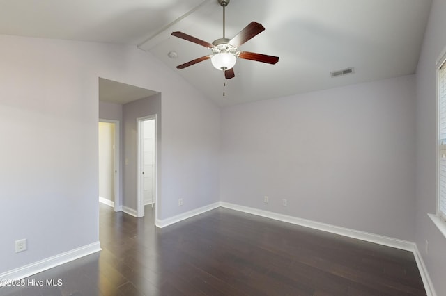 spare room featuring ceiling fan, dark hardwood / wood-style floors, and lofted ceiling with beams