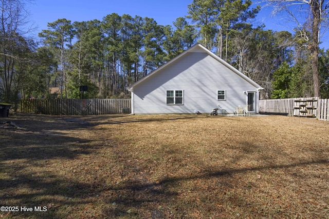 view of home's exterior with a yard