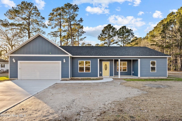 ranch-style house featuring a garage