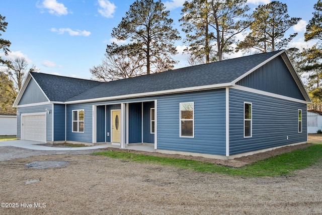 single story home with a garage