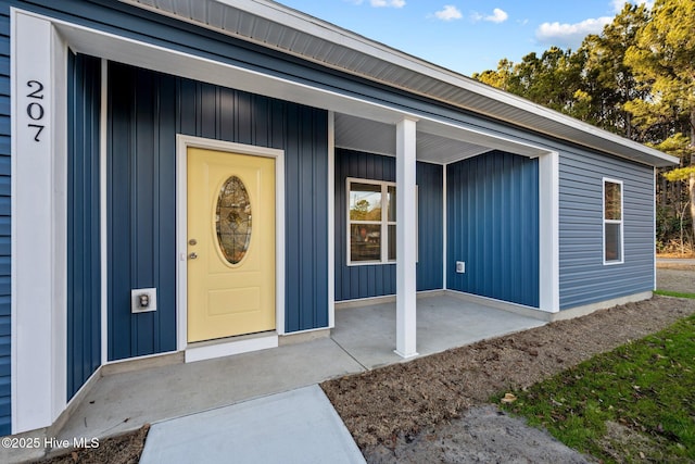 entrance to property with a porch