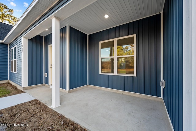 doorway to property with a patio