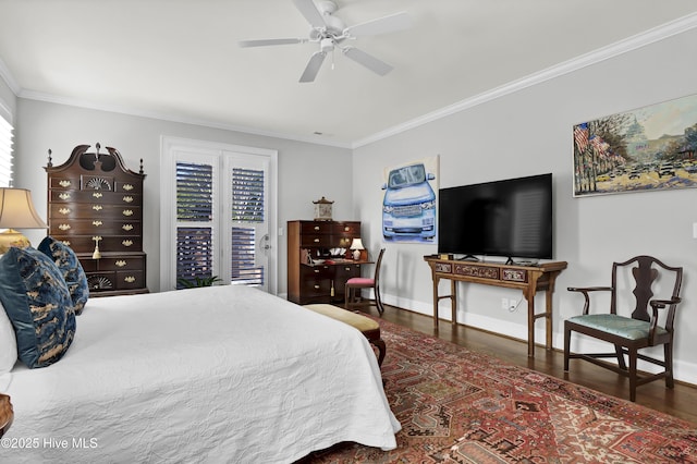 bedroom featuring ceiling fan, ornamental molding, and dark hardwood / wood-style flooring