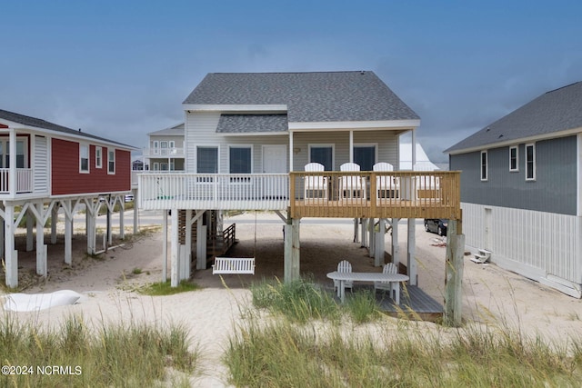 rear view of property with a deck