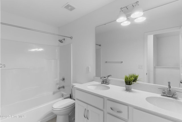 full bathroom featuring vanity, toilet, and shower / bath combination