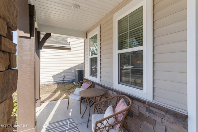 view of patio featuring covered porch and central air condition unit