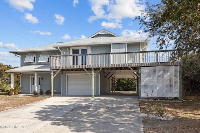 view of front facade with a carport and a garage