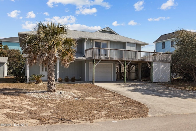 front of property with a carport and a garage