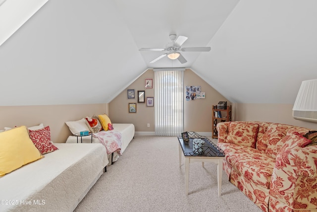 bedroom with light carpet, lofted ceiling, and ceiling fan