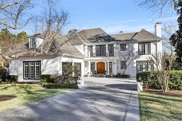 view of front of home with a front yard