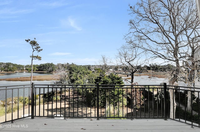 deck featuring a water view