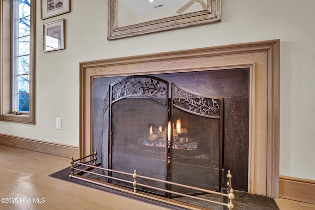 details featuring a high end fireplace