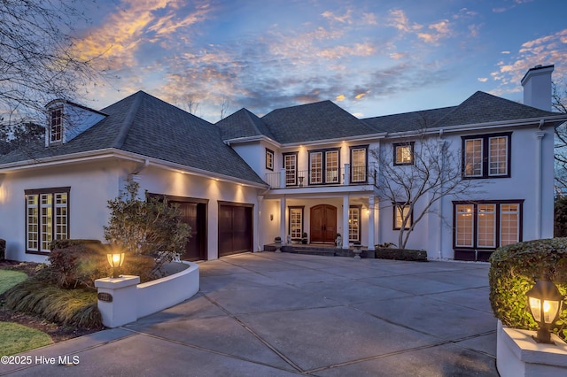 view of front of home with a balcony