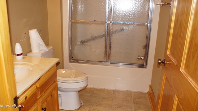 full bathroom with vanity, shower / bath combination with glass door, and toilet