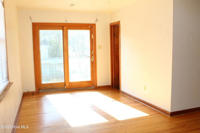 empty room featuring light wood-type flooring