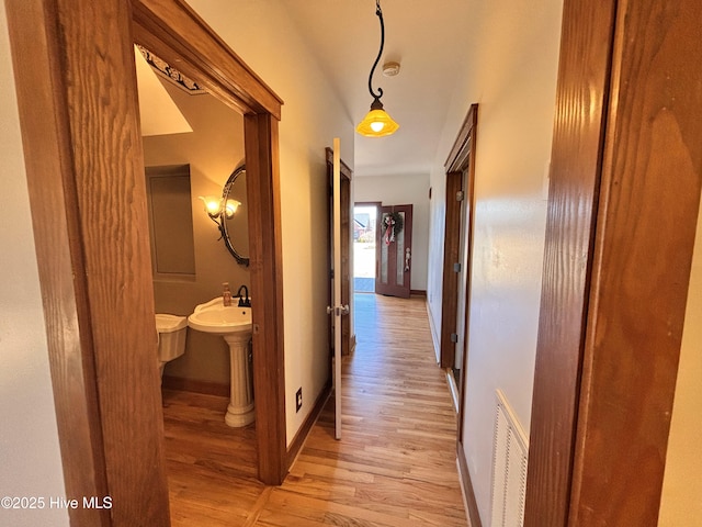 hall featuring light hardwood / wood-style floors