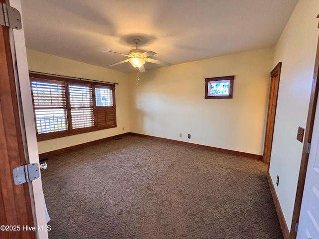 carpeted empty room with ceiling fan