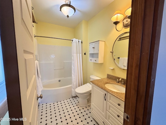 full bathroom featuring tile patterned flooring, vanity, shower / tub combo, and toilet