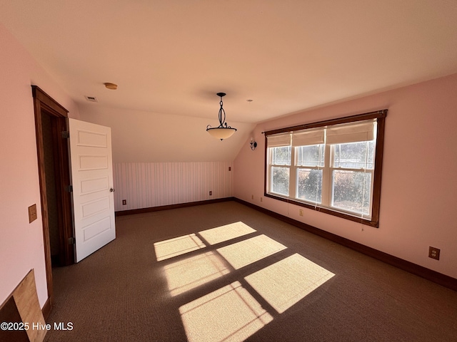 bonus room with vaulted ceiling