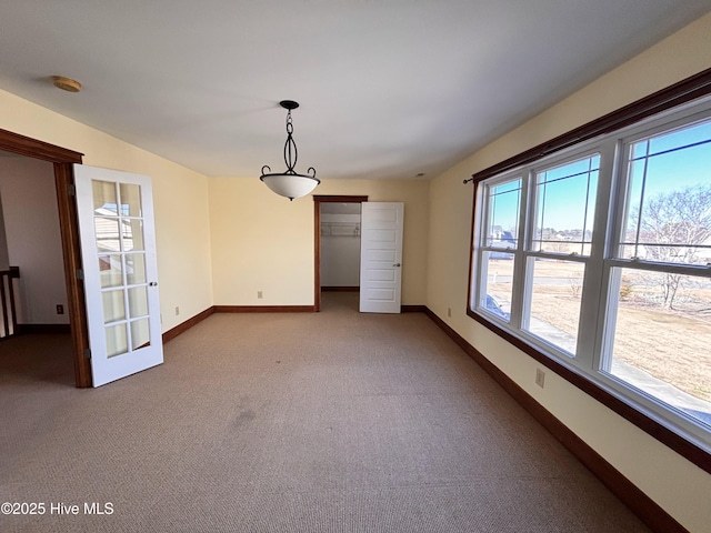 empty room with carpet flooring