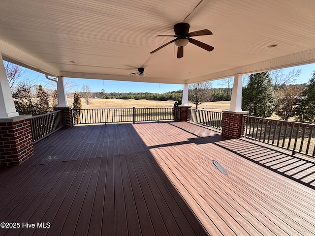 wooden terrace with ceiling fan