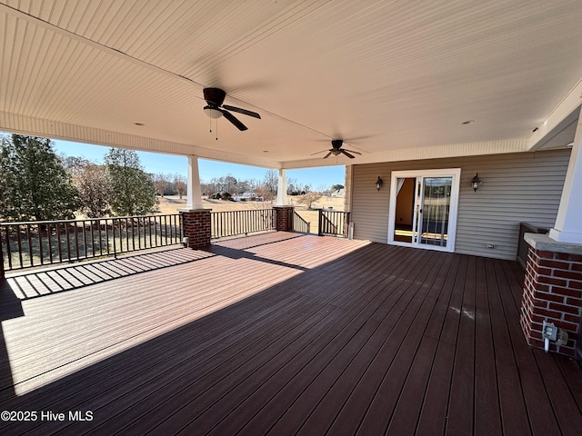 wooden deck with ceiling fan